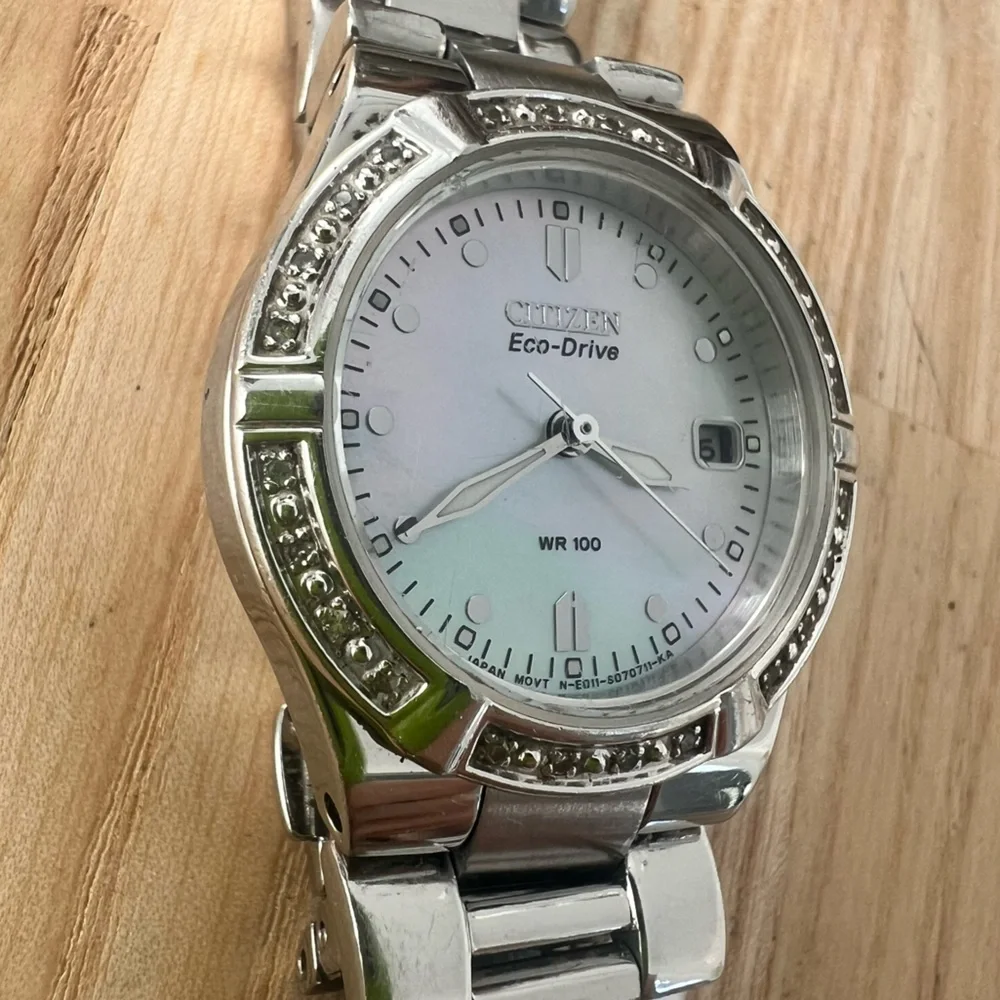Citizen eco-drive ladies silver tone diamond solar dress watch